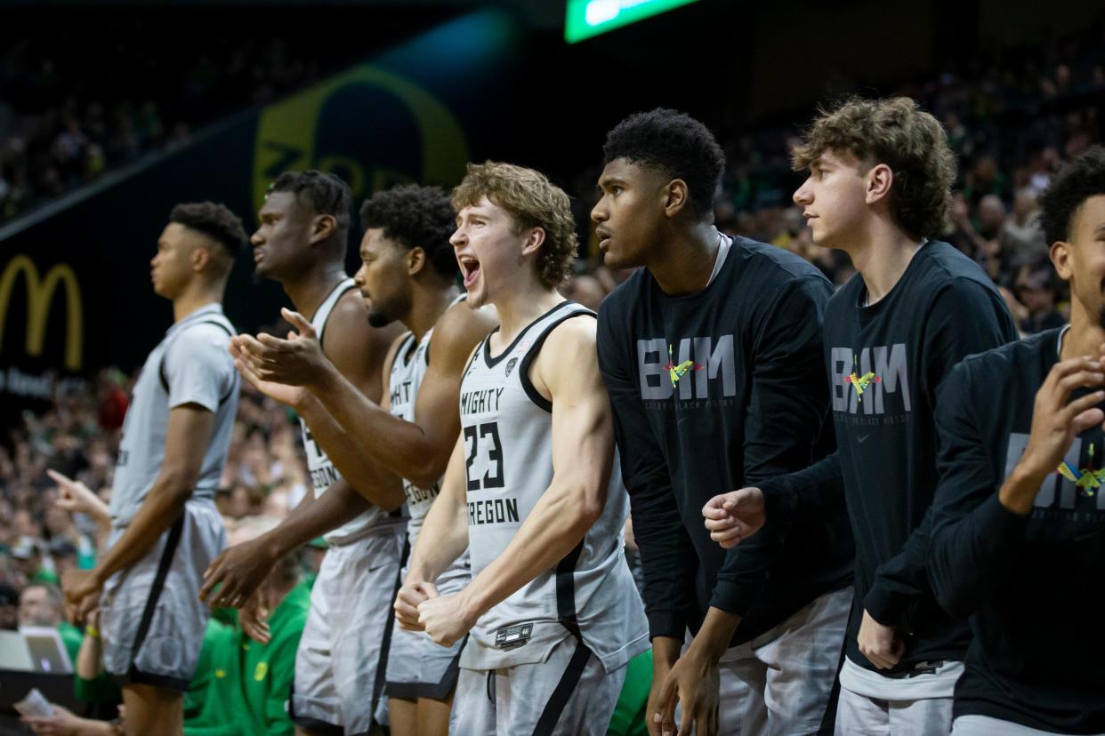 The Oregon bench cheers in the second half as the Oregon Ducks host the Washington Huskies Thursday, Feb. 8, 2024, at Matthew Knight Arena in Eugene, Ore.