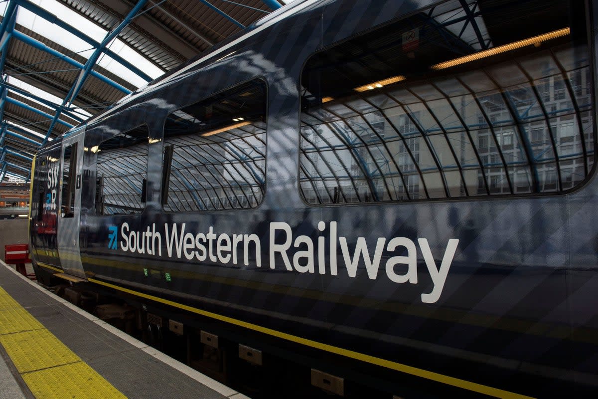 One of the UK’s busiest railway lines is blocked after a train hit an object on the track (Victoria Jones/PA) (PA Archive)