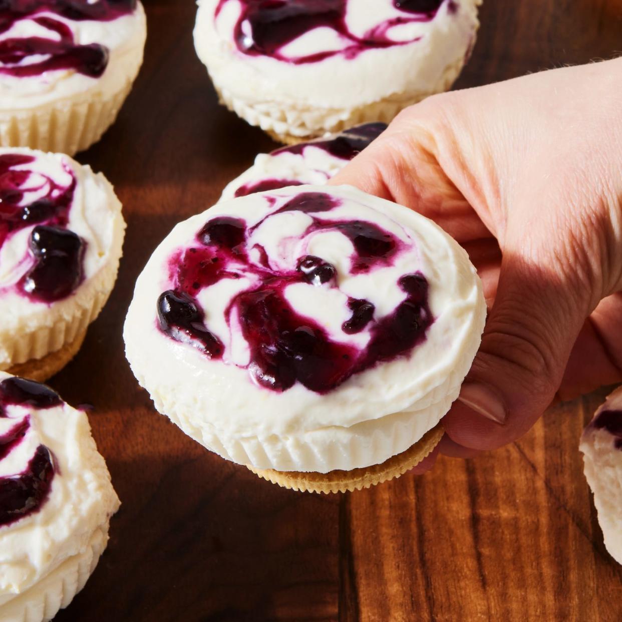 lemon blueberry mini cheesecake cupcakes with blueberry sauce