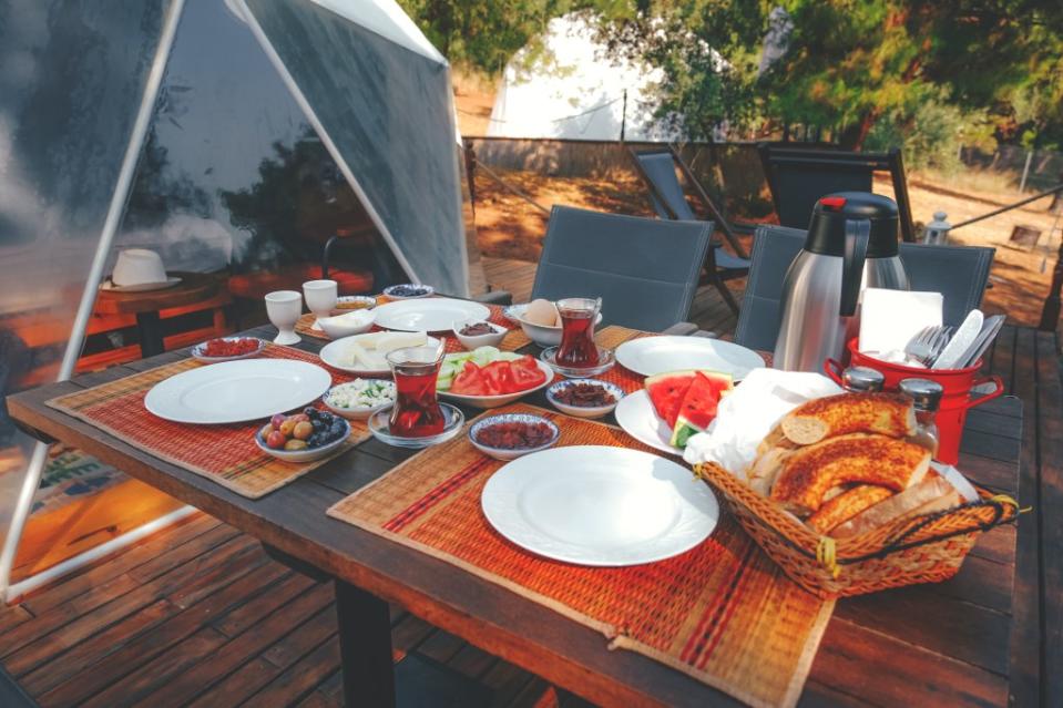 Breakfast at glamping via Getty Images.