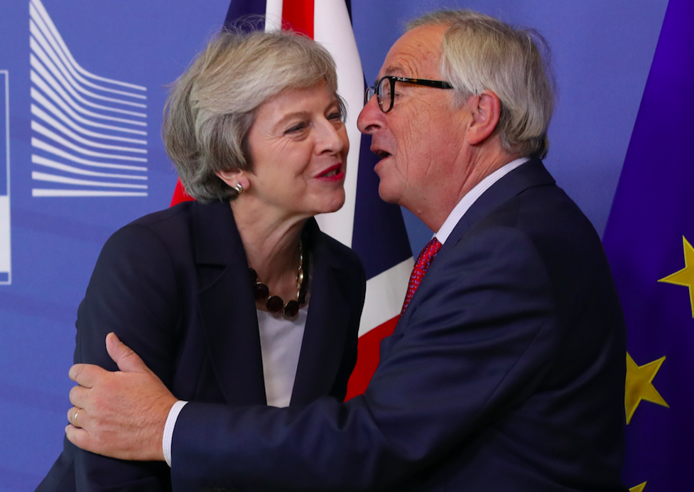 <em>Theresa May, pictured with European Commission president Jean-Claude Juncker, indicated she is ready to consider extending Britain’s transition out of the EU for a further year (Getty)</em>