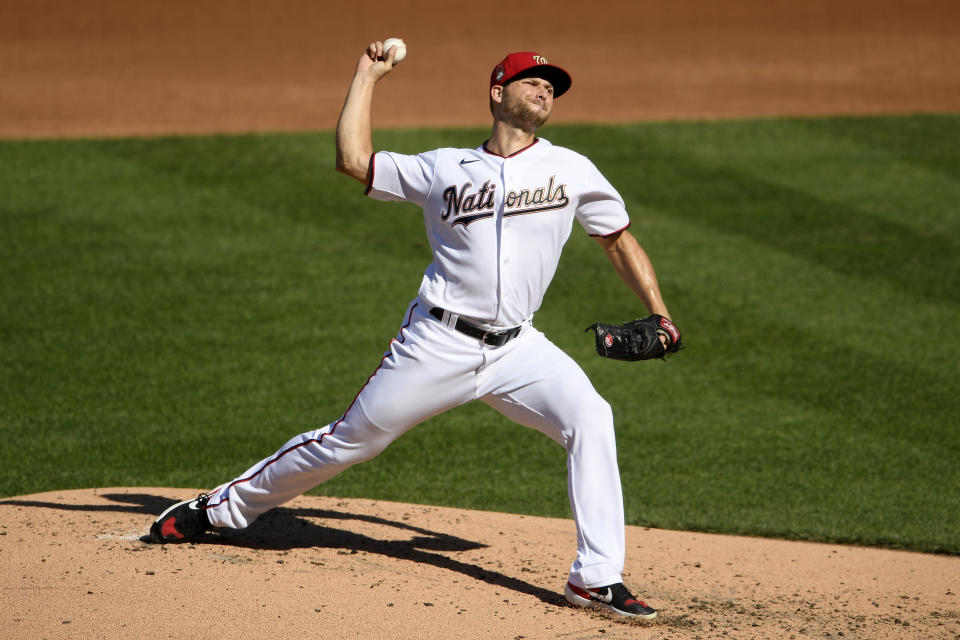 Washington Nationals starting pitcher Austin Voth delivers a pitch during the third inning of the first baseball game of a doubleheader against the Philadelphia Phillies, Tuesday, Sept. 22, 2020, in Washington. (AP Photo/Nick Wass)