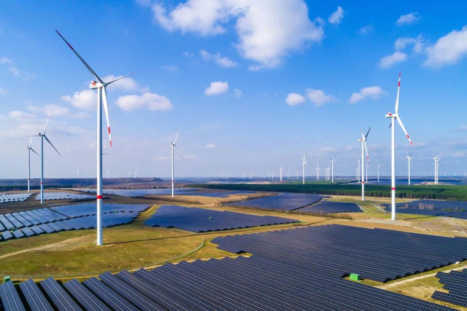 Solar panels and wind turbines near Klettwitz, Germany.