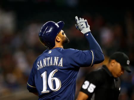 May 16, 2018; Phoenix, AZ, USA; Milwaukee Brewers outfielder Domingo Santana celebrates as he rounds the bases after hitting a solo home run in the first inning against the Arizona Diamondbacks at Chase Field. Mandatory Credit: Mark J. Rebilas-USA TODAY Sports