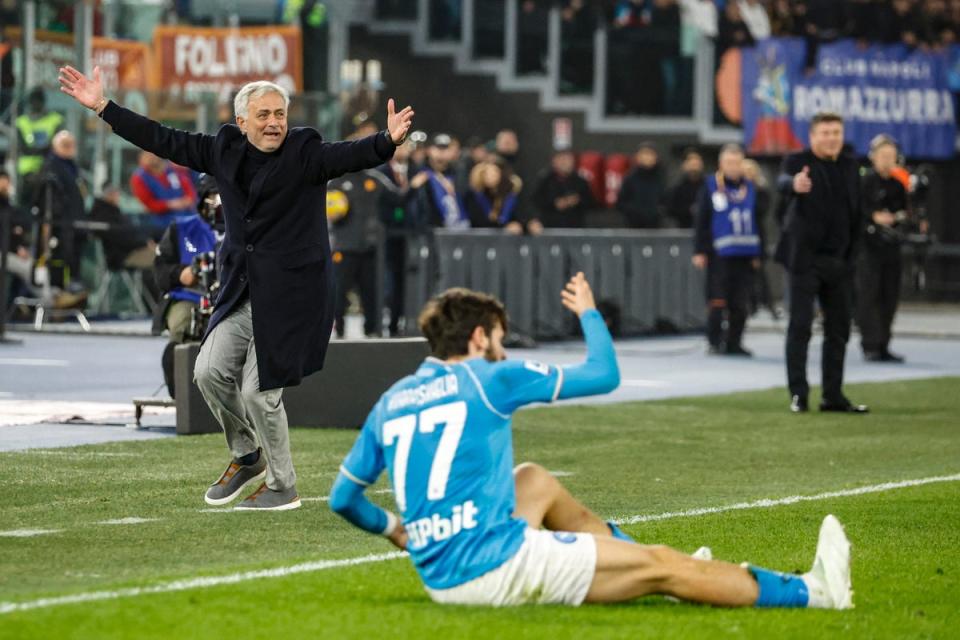 Jose Mourinho protests after Napoli’s Khvicha Kvaratskhelia is fouled (EPA)