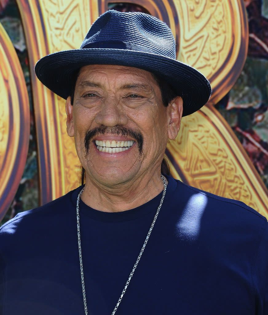 <p>Considered one of the most prolific actors of his time, Danny is a California native of Mexican descent. With <a href="https://www.imdb.com/name/nm0001803/" rel="nofollow noopener" target="_blank" data-ylk="slk:hundreds of acting credits;elm:context_link;itc:0;sec:content-canvas" class="link ">hundreds of acting credits</a> to his name, the 76-year-old <a href="https://www.imdb.com/name/nm0001803/bio?ref_=nm_ov_bio_sm" rel="nofollow noopener" target="_blank" data-ylk="slk:got his start;elm:context_link;itc:0;sec:content-canvas" class="link ">got his start</a> in 1985 on the set of <em><a href="https://www.amazon.com/Runaway-Train-Jon-Voight/dp/B00QF1FIPK?tag=syn-yahoo-20&ascsubtag=%5Bartid%7C10063.g.34123558%5Bsrc%7Cyahoo-us" rel="nofollow noopener" target="_blank" data-ylk="slk:Runaway Train;elm:context_link;itc:0;sec:content-canvas" class="link ">Runaway Train</a></em>. Although he had no intention of becoming an actor, he caught the attention of many with his signature look and boxing skills. Danny is best recognized for his roles in <em><a href="https://www.amazon.com/Heat-Michael-Mann/dp/B06XC1SNPT?tag=syn-yahoo-20&ascsubtag=%5Bartid%7C10063.g.34123558%5Bsrc%7Cyahoo-us" rel="nofollow noopener" target="_blank" data-ylk="slk:Heat;elm:context_link;itc:0;sec:content-canvas" class="link ">Heat</a></em>, <em><a href="https://www.amazon.com/Dusk-Till-Dawn-Quentin-Tarantino/dp/B009653J0S?tag=syn-yahoo-20&ascsubtag=%5Bartid%7C10063.g.34123558%5Bsrc%7Cyahoo-us" rel="nofollow noopener" target="_blank" data-ylk="slk:From Dusk Till Dawn;elm:context_link;itc:0;sec:content-canvas" class="link ">From Dusk Till Dawn</a></em>, and <em><a href="https://www.amazon.com/Desperado-Antonio-Banderas/dp/B000KEK65U?tag=syn-yahoo-20&ascsubtag=%5Bartid%7C10063.g.34123558%5Bsrc%7Cyahoo-us" rel="nofollow noopener" target="_blank" data-ylk="slk:Desperado;elm:context_link;itc:0;sec:content-canvas" class="link ">Desperado</a></em>.</p>