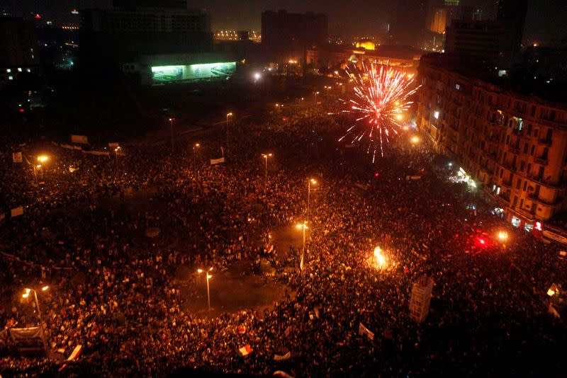 FILE PHOTO: General view of Tahrir Square as fireworks explode during a pro-democracy supporters' celebration in Cairo