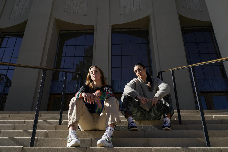California forwards Marta Suárez, left, and Claudia Langarita pose for a photograph outside Haas Pavilion on Monday, Dec. 4, 2023, in Berkeley, Calif. The two Spain nationals first became teammates and friends a decade ago while playing club basketball at ages 10 and 11. (AP Photo/Godofredo A. Vásquez)