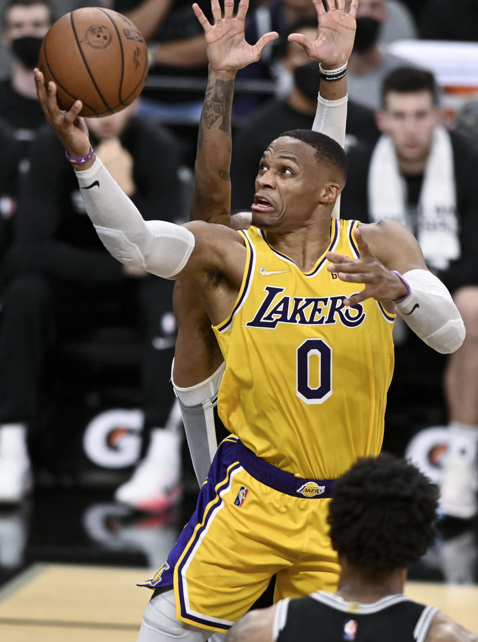 Los Angeles Lakers' Russell Westbrook shoots during the second half of an NBA basketball game against the San Antonio Spurs on Tuesday, Oct. 26, 2021, in San Antonio, Texas. Los Angeles won 125-121 in overtime. (AP Photo/Darren Abate)