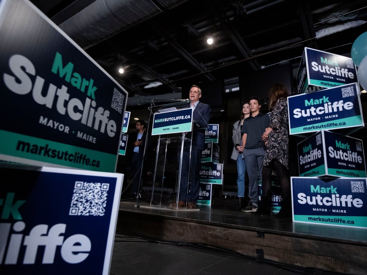 Mark Sutcliffe is joined by his family as he delivers his victory speech after being elected mayor of Ottawa Oct. 24, 2022. (Justin Tang/The Canadian Press - image credit)