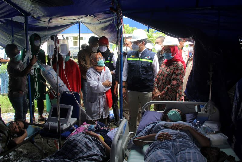 Indonesian Health Minister Budi Gunadi Sadikin visit injured people following an earthquake in Mamuju