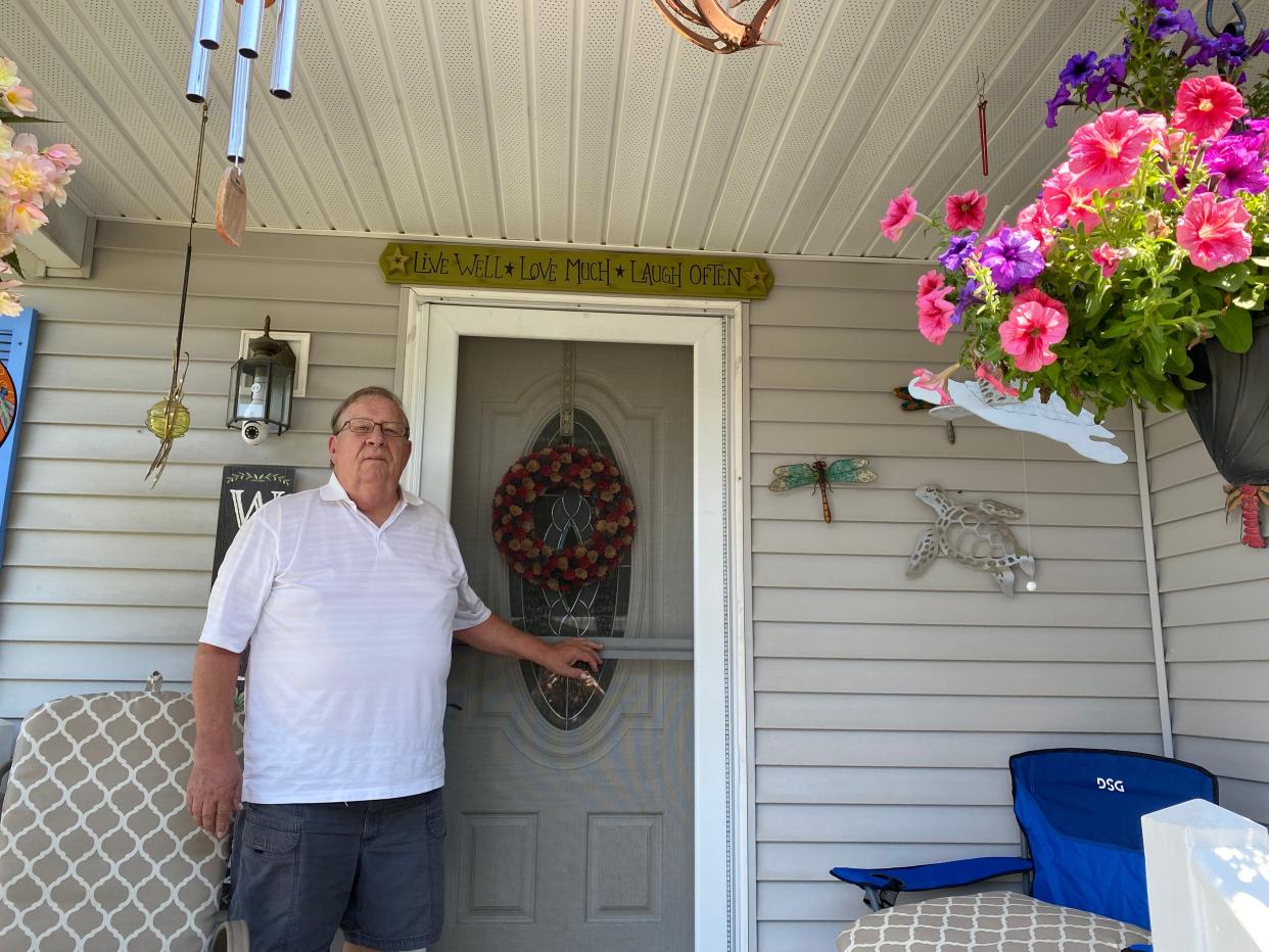 Leisurewoods resident Stuart Briggs is at the door of his manufactured home off Highland Street in Taunton on Tuesday, July 16, 2024.