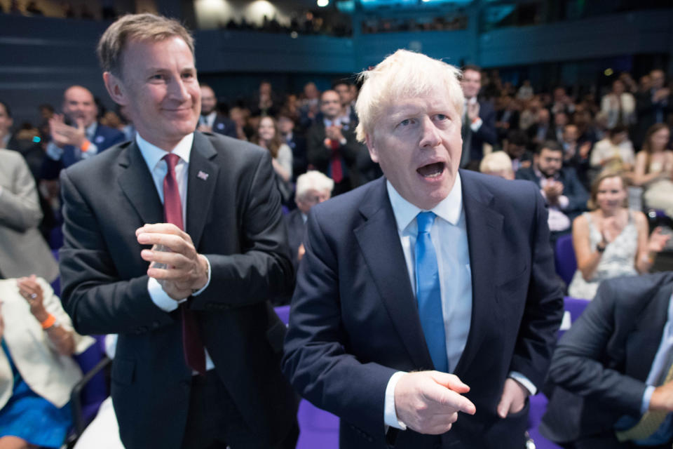 Jeremy Hunt (left) and Boris Johnson at the Queen Elizabeth II Centre in London where Mr Johson was announced as the new Conservative party leader, and will become the next Prime Minister.