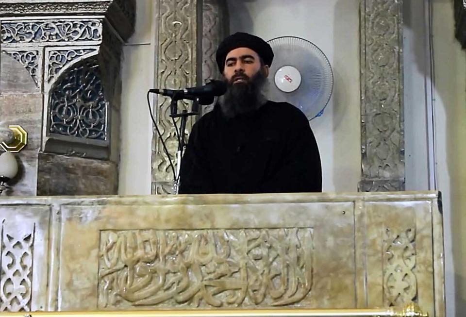 ISIS leader Abu Bakr al-Baghdadi, seen in this video screengrab, at the mosque in Mosul in 2014.