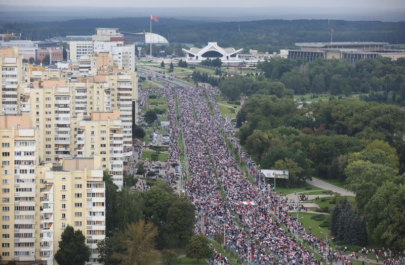 People attend an opposition rally to reject the presidential election results in Minsk