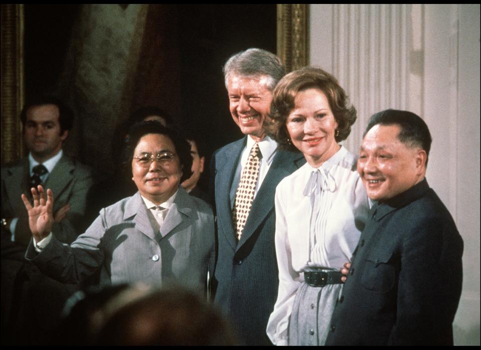 Chinese Vice Premier Deng Xiaoping, US First Lady Rosalynn Carter, US President Jimmy Carter and Deng's wife, smile Jan. 31, 1979 in White House in Washington D.C., during China's Paramount leader visit to the U.S. 