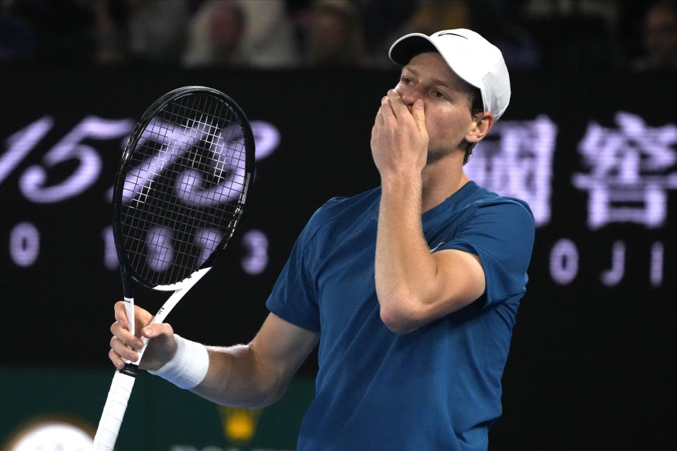 Jannik Sinner of Italy reacts during his fourth round match against Stefanos Tsitsipas of Greece at the Australian Open tennis championship in Melbourne, Australia, Sunday, Jan. 22, 2023. (AP Photo/Mark Baker)