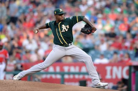 Aug 11, 2018; Anaheim, CA, USA; Oakland Athletics starting pitcher Edwin Jackson works against a Los Angeles Angels batter during the first inning at Angel Stadium of Anaheim. Mandatory Credit: Orlando Ramirez-USA TODAY Sports