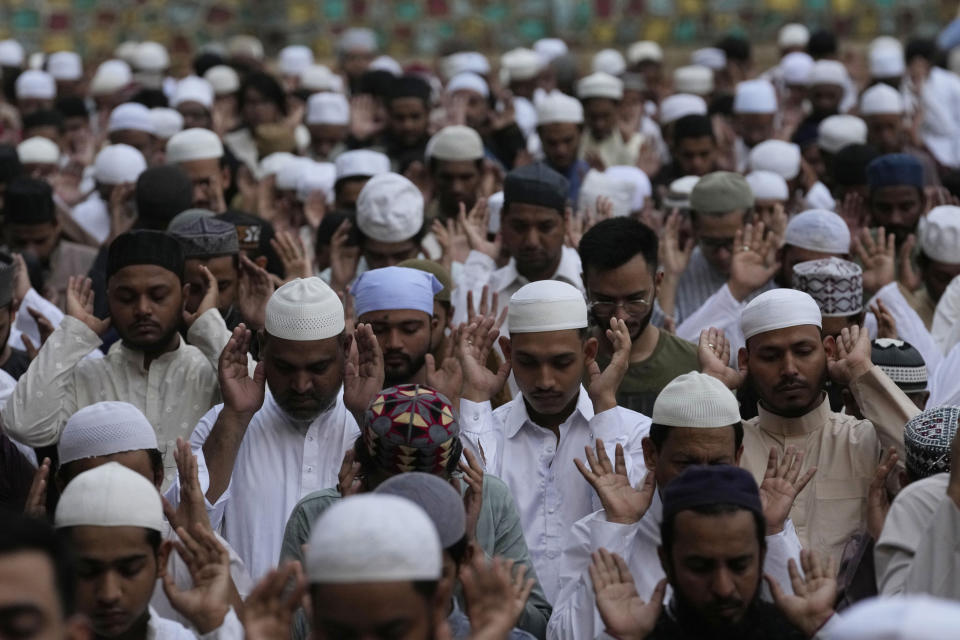 Muslims attend Eid al-Adha prayer in Mumbai, India, Monday, June 17, 2024. (AP Photo/Rajanish Kakade)