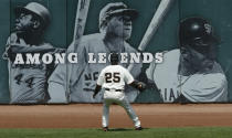 San Francisco Giants' Barry Bonds watches as a home run hit by Los Angeles Dodgers' Jeff Kent goes over the wall as he stands in front of a sign that bears the photos of, from left, Hank Aaron, Babe Ruth, and Willie Mays, Sunday, May 14, 2006, at AT&T Park in San Francisco during a MLB baseball game. Bonds remained one home run away from hitting his 714th career home run and tying Babe Ruth for second place behind Hank Aaron in career home runs. (AP Photo/Dino Vournas)