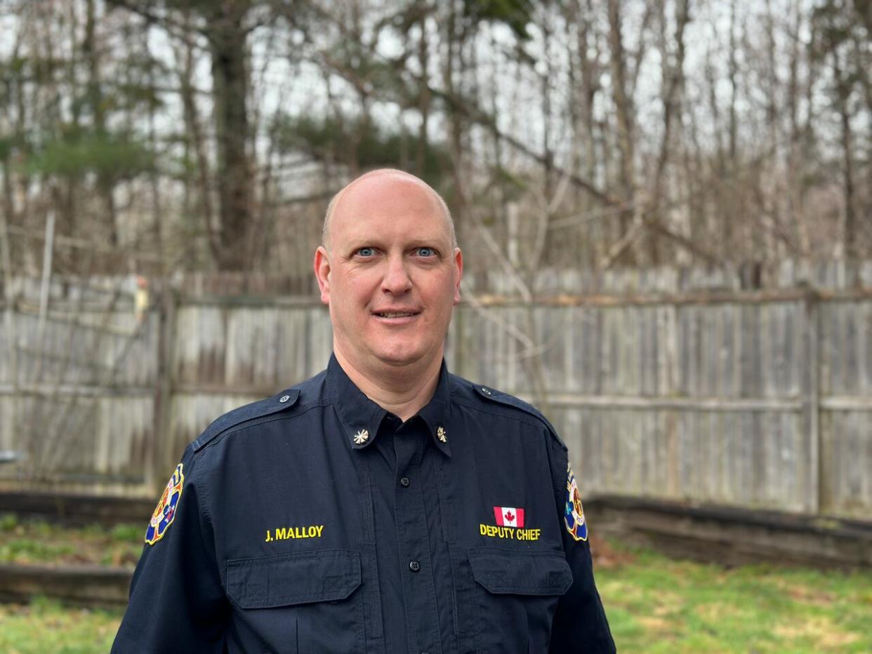 John Malloy, deputy fire chief of Riverview Fire and Rescue, says the town hopes to talk to residents about ways they can reduce the risk from wildfires around their properties.  (Shane Magee/CBC - image credit)