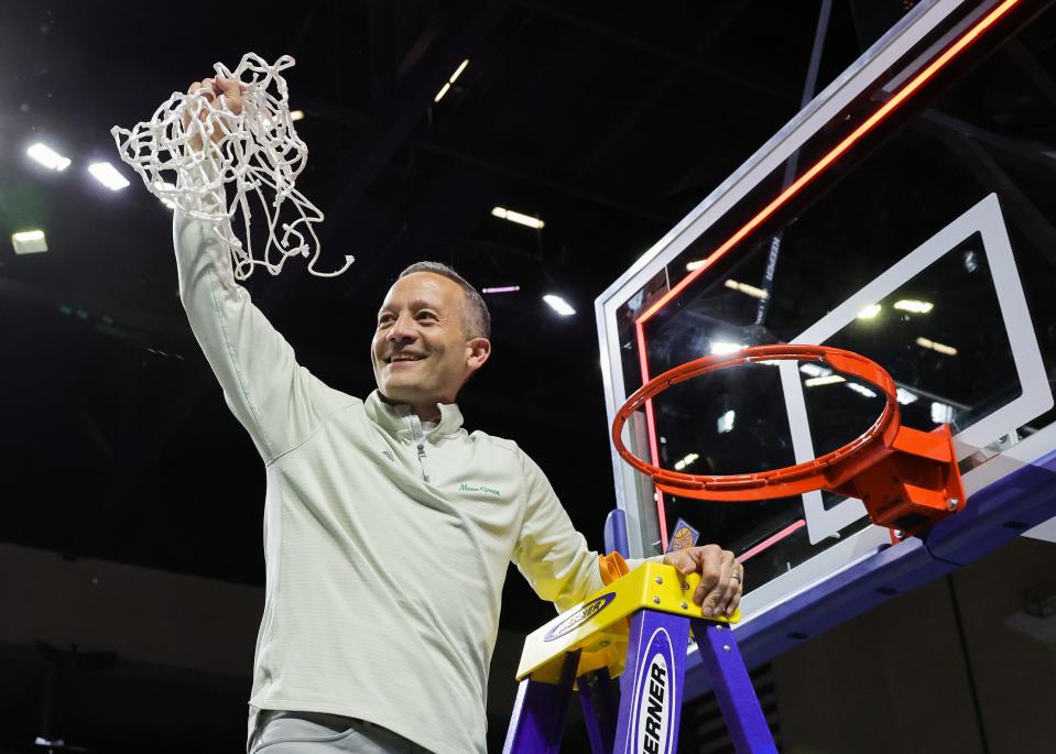 LAS VEGAS, NEVADA - MARCH 30: Head coach Grant McCasland of the North Texas Mean Green poses after cutting a net down after the team's 68-61 victory over the UAB Blazers to win the championship game of the NIT basketball tournament at the Orleans Arena on March 30, 2023 in Las Vegas, Nevada. (Photo by Ethan Miller/Getty Images) ORG XMIT: 775958235 ORIG FILE ID: 1478306252