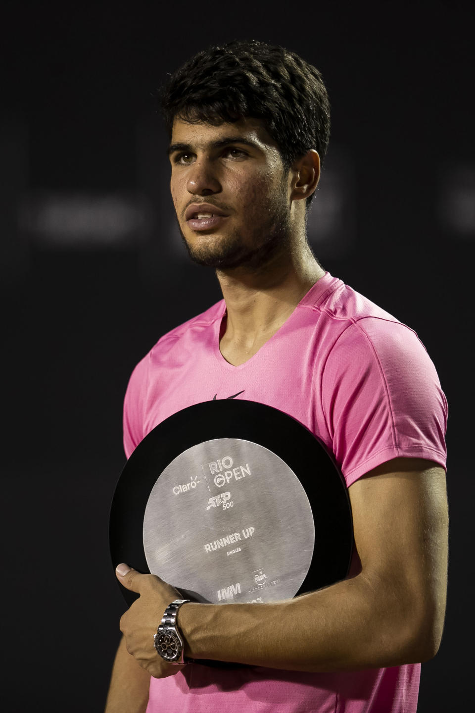 Carlos Alcaraz of Spain holds the second place trophy following the Rio Open Tennis tournament final against Cameron Norrie of the United Kingdom, in Rio de Janeiro, Brazil, Sunday, Feb. 26, 2023. (AP Photo/Bruna Prado)