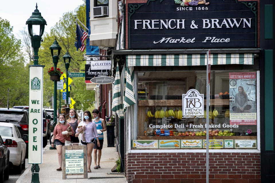 Shops that cater to tourists start to reopen under strict guidelines to help prevent the spread of coronavirus, Thursday, May 28, 2020, in Camden, Maine. The pandemic has meant a sharp drop in the number of tourists visiting the state's coastal towns. (AP Photo/Robert F. Bukaty)