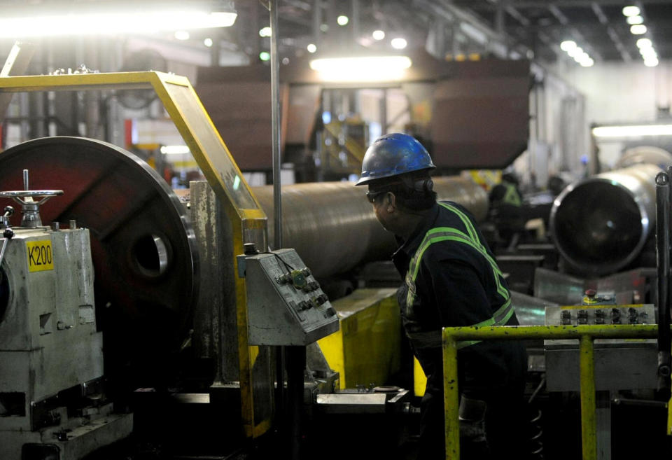 Workers are seen at at Bri-Steel Manufacturing, a manufacturer and distributer of seamless steel pipes, in Edmonton, Alberta, Canada, June 21, 2018.  Picture taken June 21, 2018. REUTERS/Candace Elliott