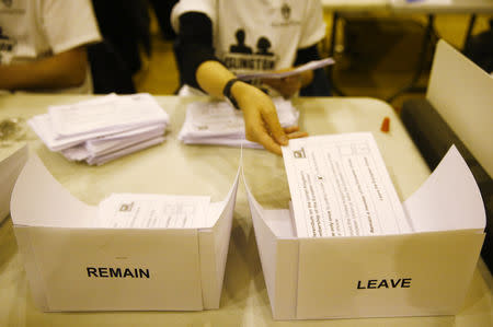 FILE PHOTO - A workers counts ballots after polling stations closed in the Referendum on the European Union in Islington, London, Britain, June 23, 2016. REUTERS/Neil Hall
