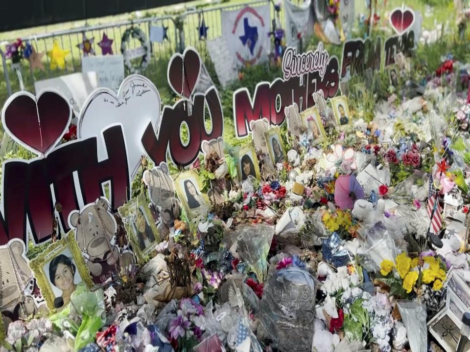 Posters, flowers and portraits fill the lawn in front of Robb Elementary School in Uvalde, Texas, where a gunman killed 19 students and two teachers at the school on May 24. <a href="https://newsroom.ap.org/detail/MassShootingsMarginalizedGroups/3303aa68c2364950971ad579e71e9a6f/photo?Query=%20memorial%20uvalde&mediaType=photo&sortBy=arrivaldatetime:desc&dateRange=Anytime&totalCount=382&currentItemNo=5" rel="nofollow noopener" target="_blank" data-ylk="slk:AP Photo/Lekan Oyekanmi;elm:context_link;itc:0;sec:content-canvas" class="link ">AP Photo/Lekan Oyekanmi</a>