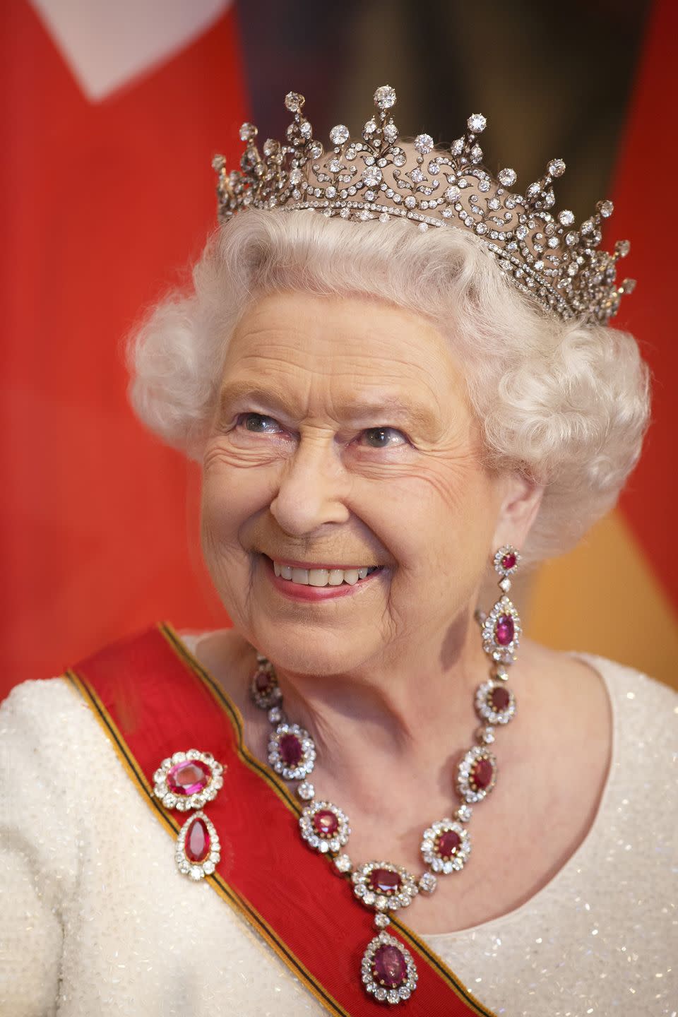 <p>The Girls of Great Britain and Ireland tiara is the headpiece most frequently worn by the Queen–it's even featured in her portrait on British currency. The tiara was a wedding gift from her grandmother, Queen Mary, and the first she owned herself. The tiara was originally a wedding gift for Mary when she married the Duke of York, who later became George V, in 1893. It was from the girls of Great Britain and Ireland, and commissioned by a committee lead by her friend, Lady Eve Greville.</p>