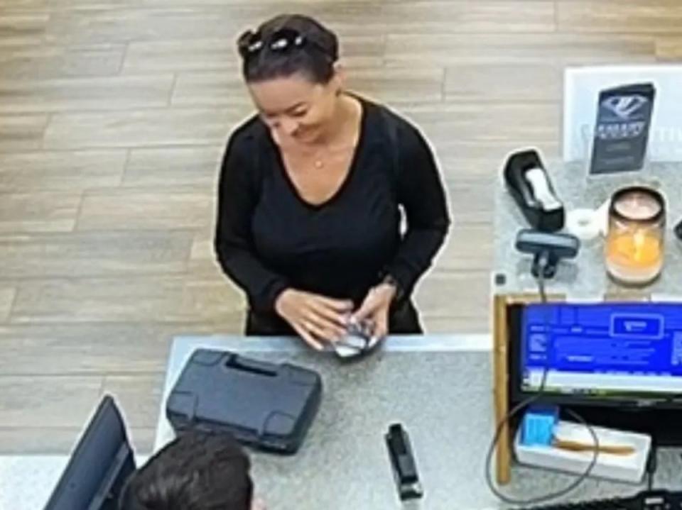 Surveillance footage obtained by the Robeson County Sheriff’s Department shows Mica Miller purchasing a handgun from a pawnshop on 27 April, the day she died (Robeson County Sheriff’s Office)