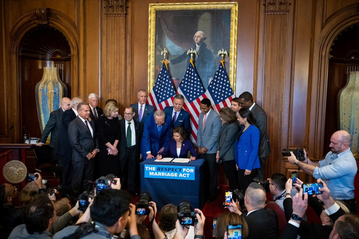 House Speaker Nancy Pelosi signs the Respect for Marriage Act at the U.S. Capitol in Washington, D.C., on Dec. 8, 2022.