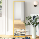 <p><strong>Mercury Row</strong></p><p>wayfair.com</p><p><strong>$97.99</strong></p><p>Mirrors don't come cheap — it's rare to find a full-length mirror with a sturdy frame like this for under $100. It has a timeless, minimal gold frame that goes with any decor and is made of high-quality shatterproof glass. Thanks to its generous height and width, we consider it an ideal dressing mirror, perfect for your bedroom or walk-in closet.</p>