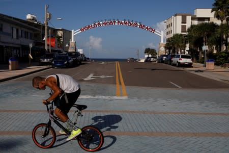 A sign at the entrance of the beach is seen ahead of the arrival of Hurricane Dorian in Daytona Beach