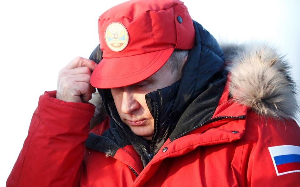 Russian President Putin visits remote Arctic islands of Franz Josef Land - Credit: Reuters