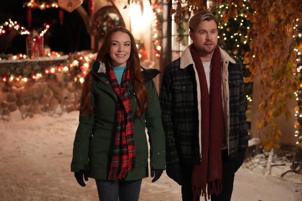 Lindsay Lohan plays a spoiled hotel heiress with amnesia afgter a nasty ski accident and Chord Overstreet is the kindly lodge owner who takes care of her in the Netflix holiday romance "Falling for Christmas."