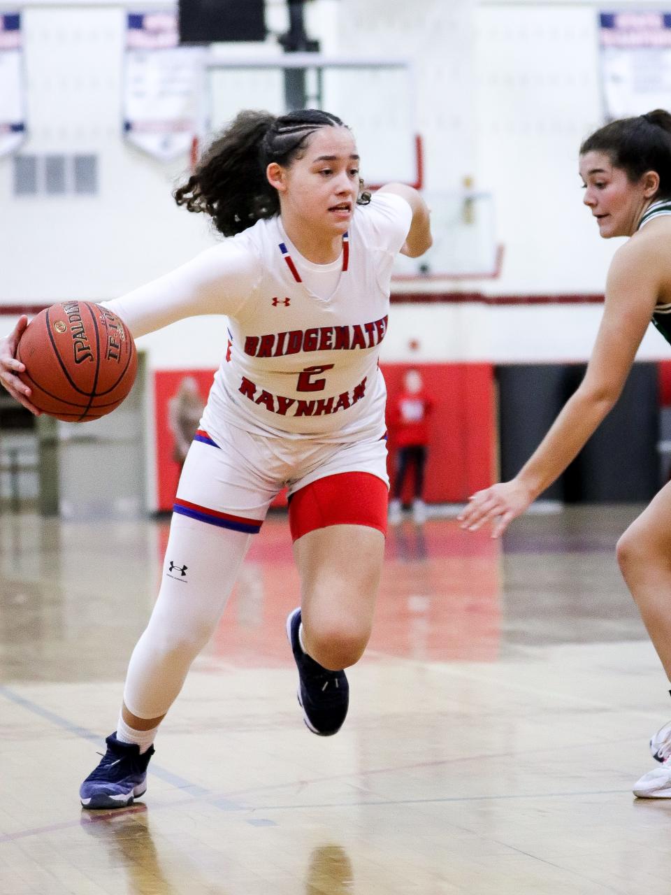 Bridgewater-Raynham's Natalia Hall-Rosa drives to the basket during a game against Dartmouth on Monday, Feb. 13, 2023.