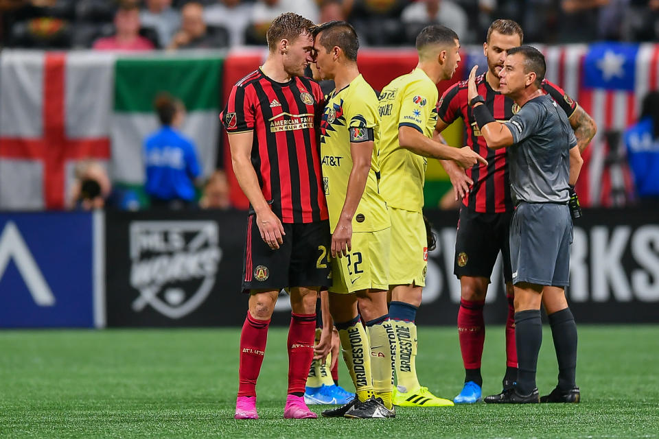 ATLANTA, GA  AUGUST 14:  Atlanta's Julian Gressel (24) and Club America's Paul Aguilar (22) are nose to nose during the Campeones Cup match between Club America and Atlanta United FC on August 14th, 2019 at Mercedes-Benz Stadium in Atlanta, GA.  (Photo by Rich von Biberstein/Icon Sportswire via Getty Images)