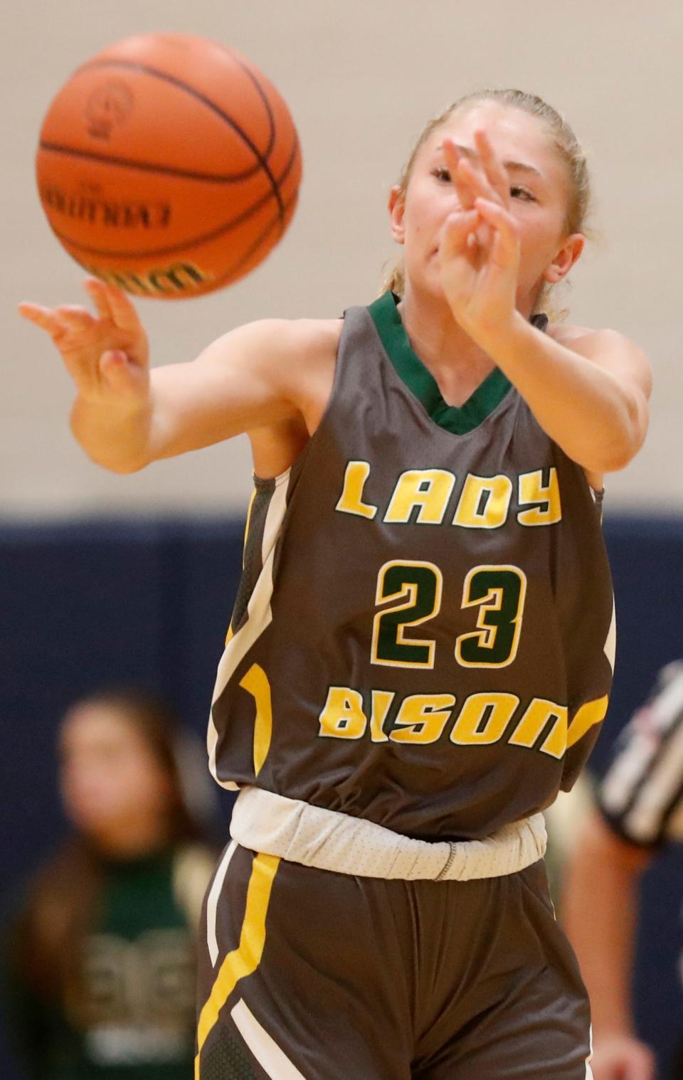 Benton Central Bison Sienna Foster (23) passes the ball during the IU Health Hoops Classic girl’s basketball third place game against the Central Catholic Knights, Saturday, Nov. 18, 2023, at Harrison High School in West Lafayette, Ind. Benton Central won 63-42.