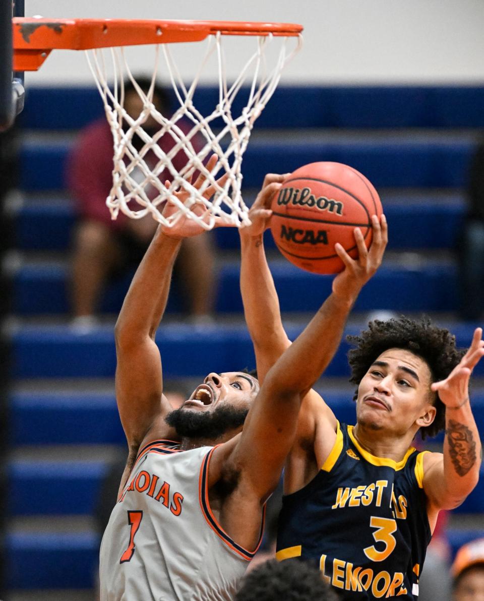 College of the Sequoias' Seth Dawson and West Hills College-Lemoore's Mack Tarver Jr. battle for a rebound in mens basketball on Wednesday, January 26, 2022. 