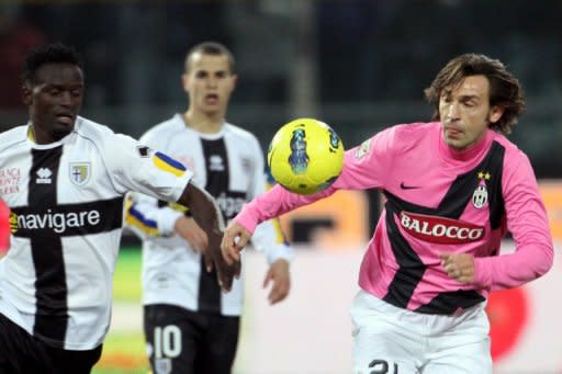 Juventus' Pirlo (R) and Parma's McDonald Mariga during their Italian Serie A match on February 15. Juve missed the chance to go back to the top of the table in midweek when they were held to a 0-0 draw at Parma