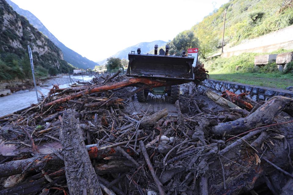 Debris is cleared away.