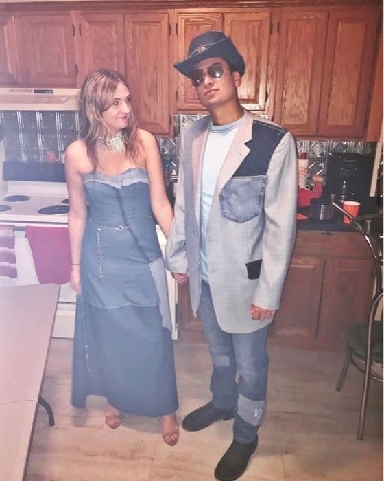 Two people dressed in all-denim, perfectly matching Britney Spears and Justin Timberlake's 2001 red carpet look