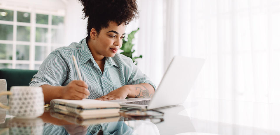 A woman working at her computer