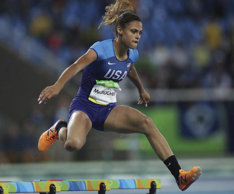 FILE - United States' Sydney McLaughlin competes in a women's 400-meter hurdles heat during the athletics competitions of the 2016 Summer Olympics in Rio de Janeiro, Brazil, Aug. 15, 2016. Sydney McLaughlin-Levrone plans on defending her title in the 400-meter hurdles at the Olympics, and has scratched from the 200 and 400-meter flat races that she had originally signed up for. The world-record holder had been entered in all three races for this month's U.S. Olympic trials, but as of Tuesday, June 18, 2024, she was listed as a “scratch” in the 200 and 400.(AP Photo/Lee Jin-man, File)