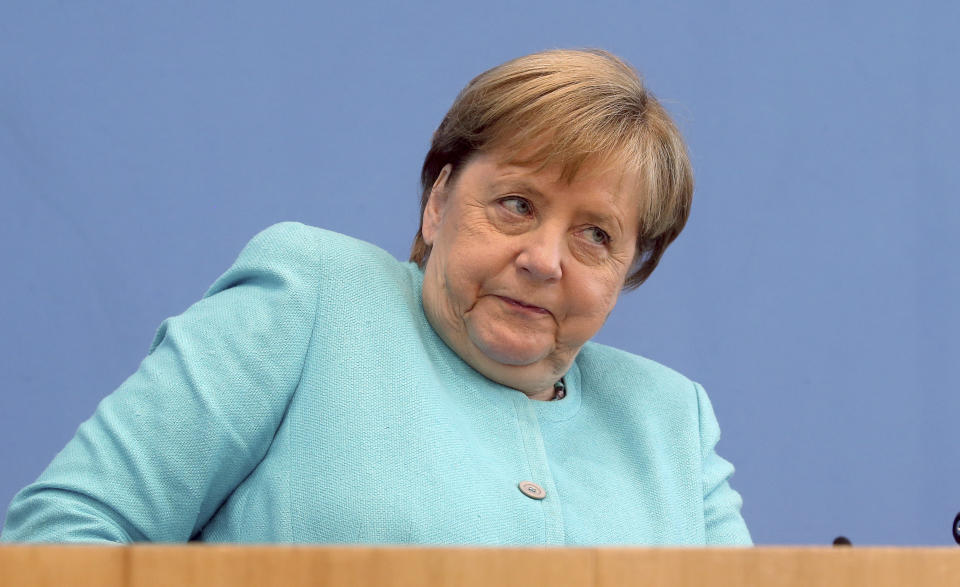 German Chancellor Angela Merkel, looks on, as she holds her annual summer news conference in Berlin, Germany, Thursday, July 22, 2021. (Wolfgang Kumm/dpa via AP)