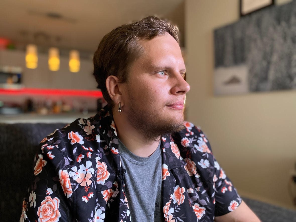 Samuel Colin is an advanced care paramedic on acute psychological injury leave in Regina. He says he wanted to speak up about his experience in Saskatchewan's heavily strained health-care system so that other paramedics won't feel alone.  (Kirk Fraser/CBC - image credit)