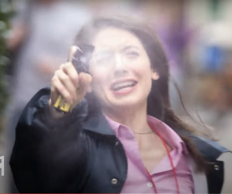 Annie from Community sprays pepper spray while running